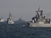 NATO ships and aircraft assist search for person overboard