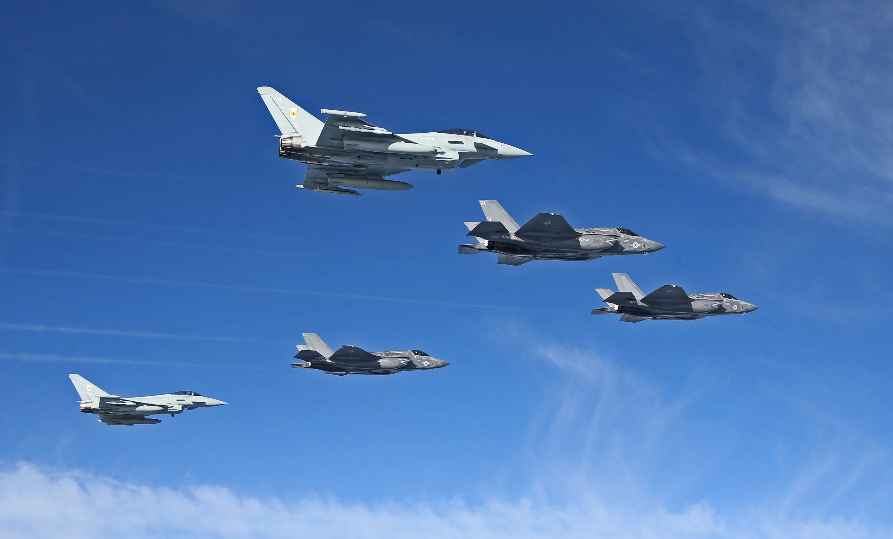 IN PICTURES: Typhoons escort F-35 into British airspace