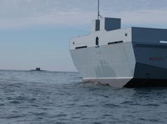 Royal Navy escorts surfaced Russian sub as it passes the UK