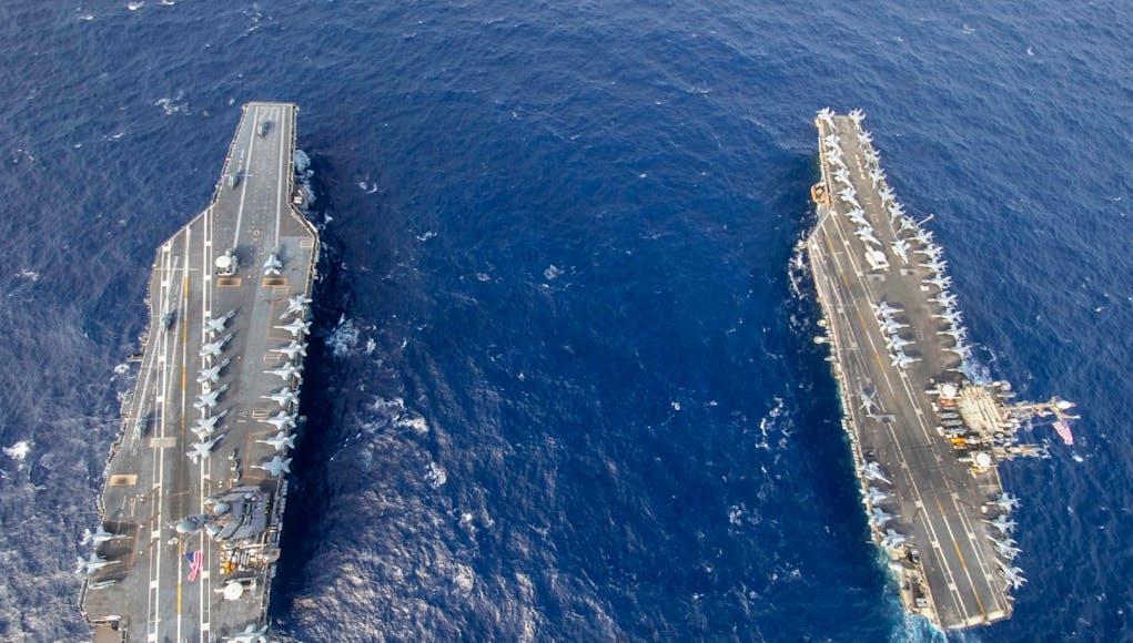 Overhead_view_of_USS_Gerald_R._Ford_28CVN-7829_and_USS_Harry_S._Truman_28CVN-7529_in_the_Atlantic_Ocean_on_4_June_2020_28200604-N-OH637-145329