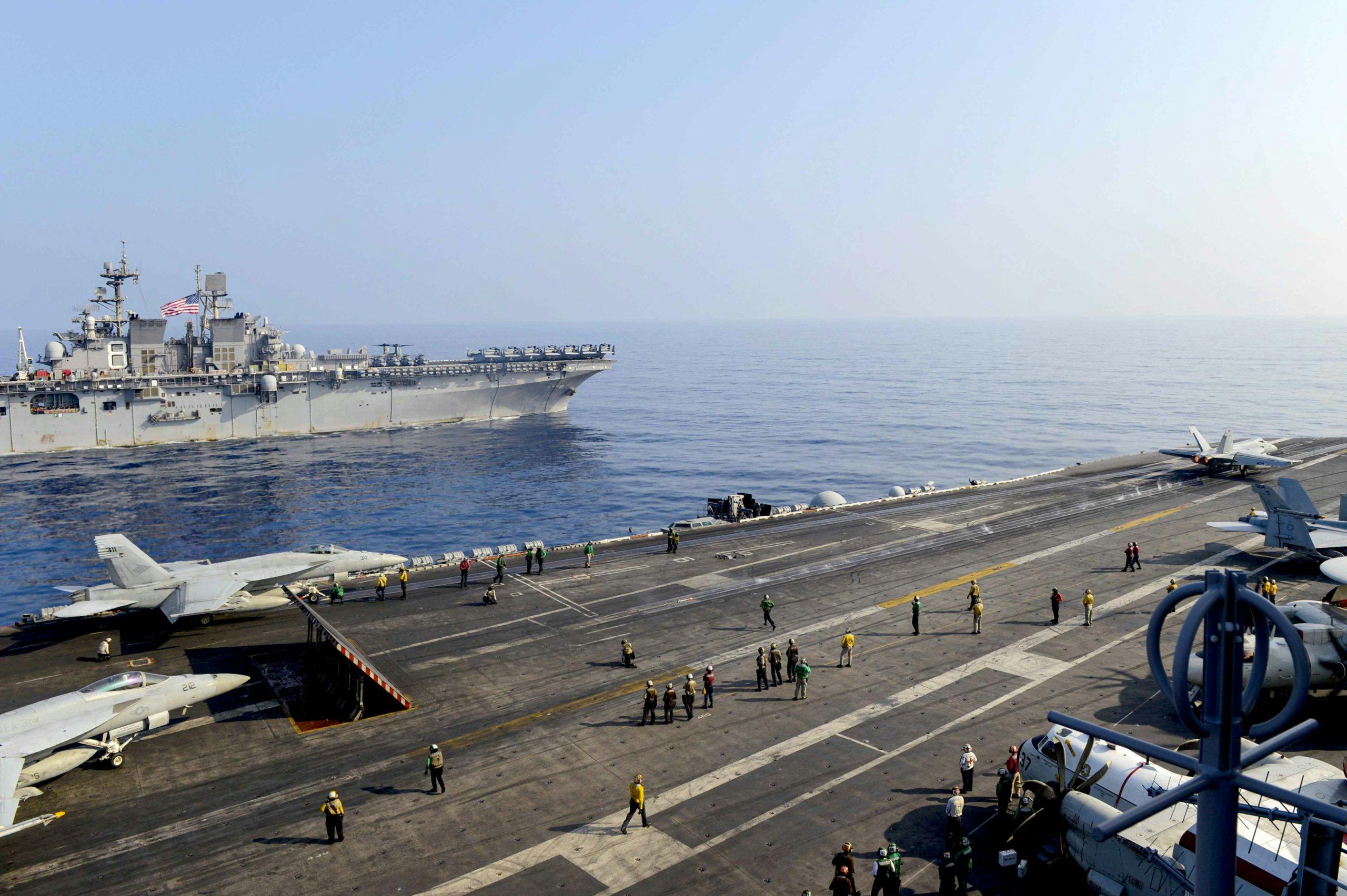 American supercarrier and assault ship operate in South China Sea
