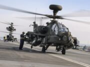 Apache attack helicopters land on carrier
