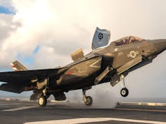 F-35Bs launch from HMS Queen Elizabeth and land on USS America