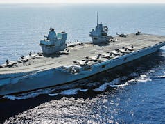 British aircraft carrier hosts senior NATO officials