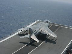 Britain trialling Harrier jets on carriers USMC-Harrier-Abroad-British-Warship-HMS-Illustrious-2007.jpg
