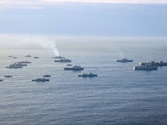 British carrier leads huge fleet to ‘demonstrate naval might’