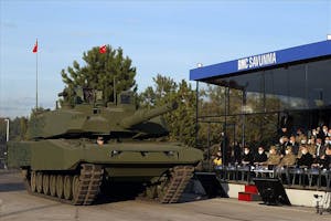 Turkey_unveils_new_Leopard_2A4_main_battle_tank_upgrade_fitted_with_Altay_tank_turret_925_001.jpg
