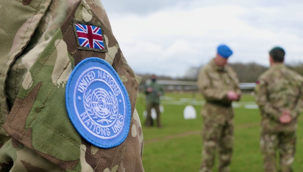 Members of The Household Cavalry have swapped their regimental berets for the distinctive blue UN peacekeeping beret ahead of a six-month UN peace-keeping tour in Cyprus.