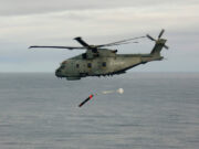 Helicopters from HMS Queen Elizabeth launch torpedos