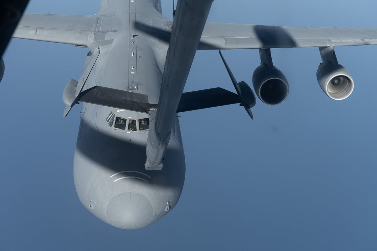 American C-5 transport conducts reverse flow air refuelling