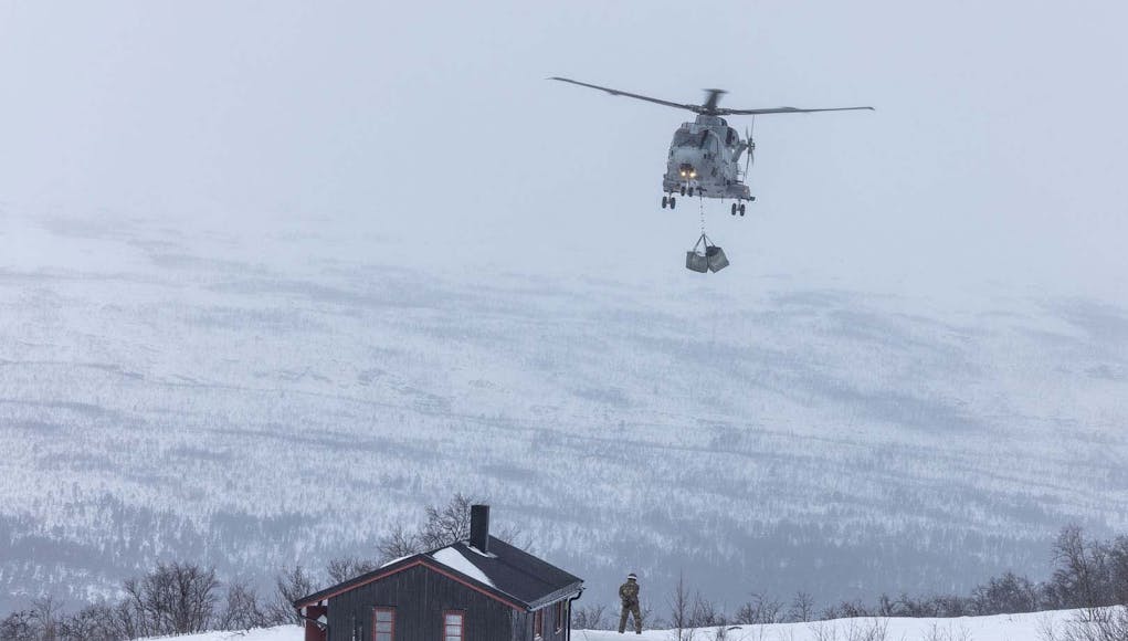 MIGHTY MERLINS DELIVER ESSENTIAL FIREWOOD TO ARCTIC SURVIVAL CABINS