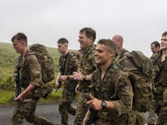 Royal Marines receive Green Berets from First Sea Lord