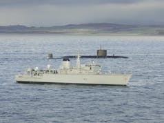 HMS Cattistock works with a nuclear sub and Merlin heli