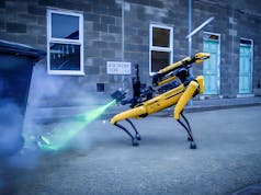 Robotic dogs use lasers to help detect and defuse bombs