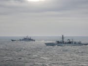 British warships in show of force to Russian vessel
