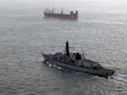 British warships shadow Russian task force near UK waters
