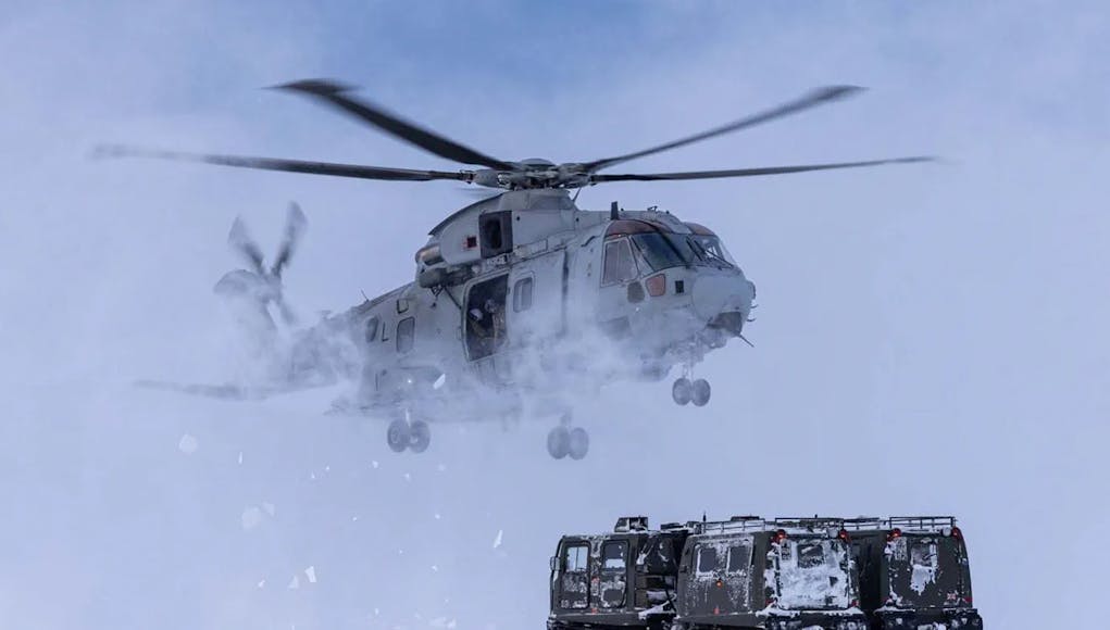 An 845 NAS Merlin stirs up snow on NATO exercises in Norway
