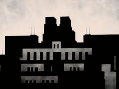 Former MI6 chief backs ID cards and warns Putin