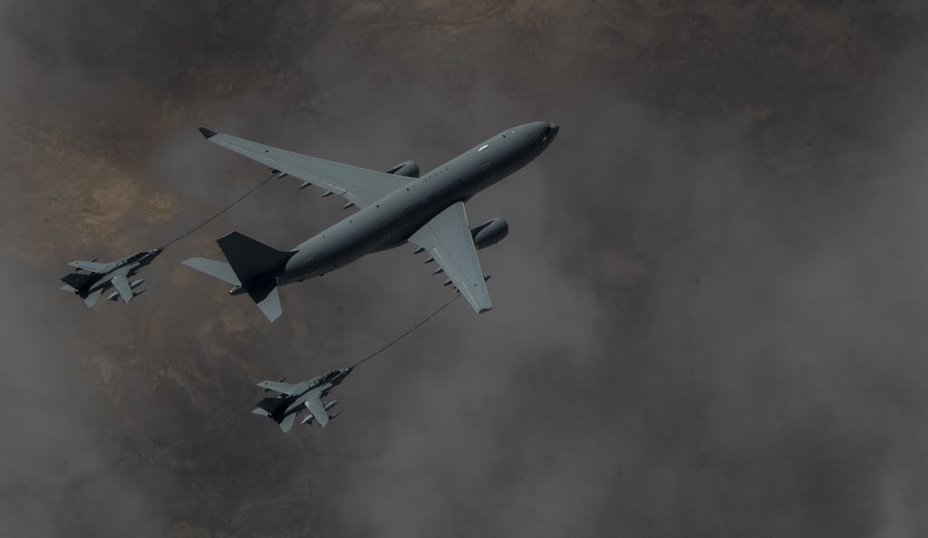 A Royal Air Force Voyager KC2 refuels two RAF Tornado GR4, March 4, 2015, over Iraq. The RAF aircraft provide combat air support for the coalition against Da'esh. (U.S. Air Force photo by Staff Sgt. Perry Aston/RELEASED)