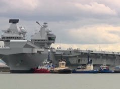 HMS Queen Elizabeth heads to sea for trials
