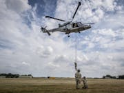 16 Air Assault Brigade troops fast-rope from Wildcat helicopter