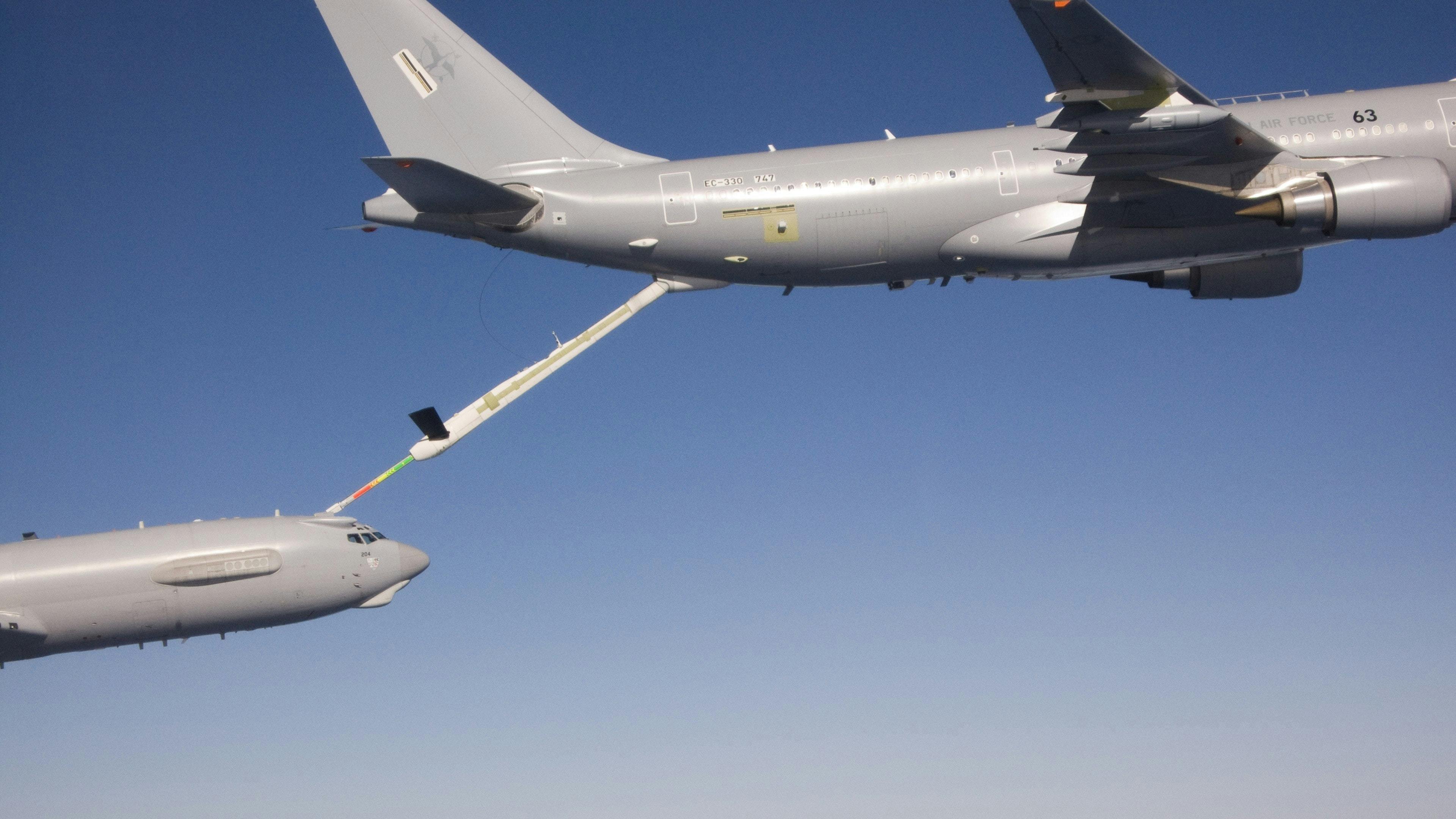 An Australian tanker, the same type of aircraft as Voyager, using its boom to refuel an aircraft.