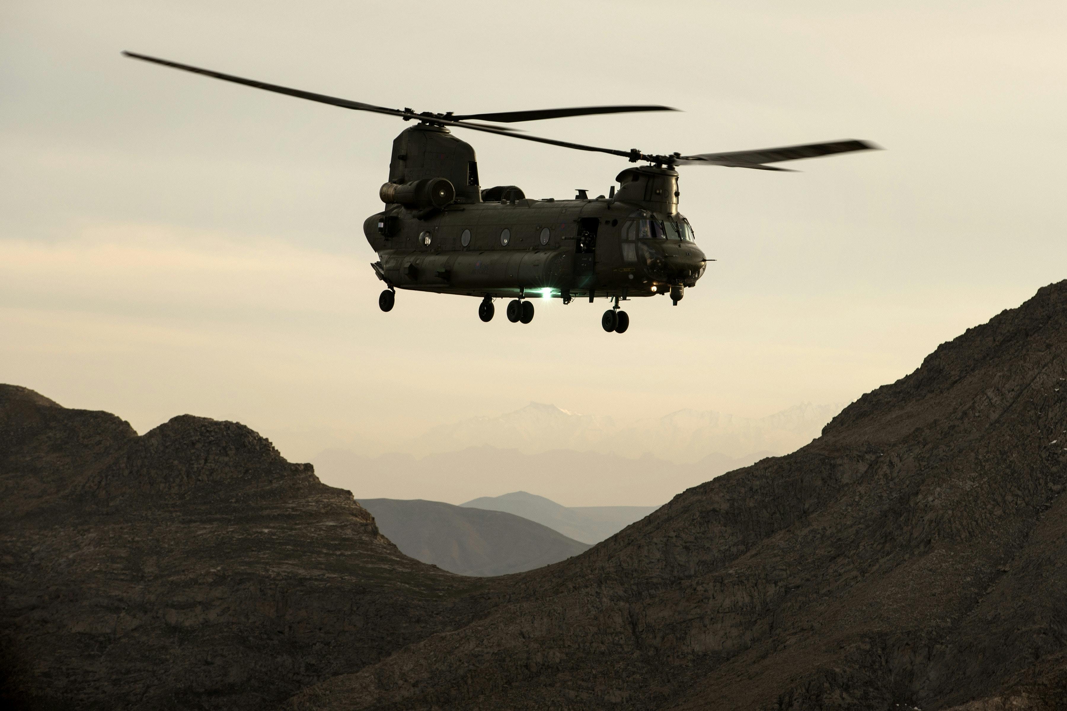 An RAF Chinook helicopter flying over the mountains of Afghanistan. Synonymous with operations in Afghanistan over the last thirteen years, the Chinook Force flew over 41,000 hours, extracted 13,000 casualties and its crews have been awarded numerous gallantry awards, including twenty three distinguished flying crosses for bravery in the air.