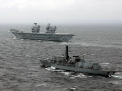 HMS Sutherland, HMS Iron Duke escorting HMS Queen Elizabeth on sea trials