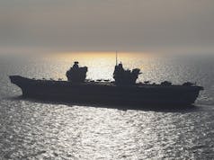 Aircraft carrier ‘opens fire’ with heavy machine guns