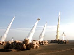 Iran launches missiles into Syria