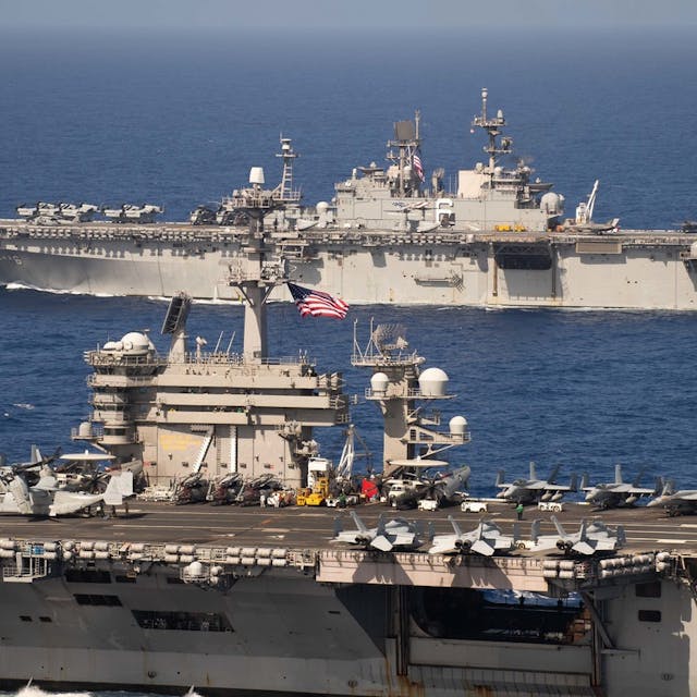 US supercarrier and assault ship team up for joint operations